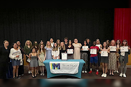  Members of the Tri-M Music Honor Society at their induction ceremony